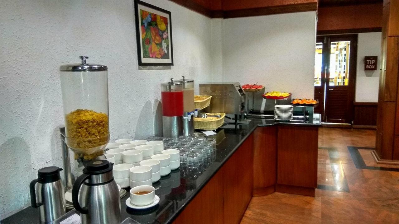 Elysium Garden Hotel Munnar Bagian luar foto