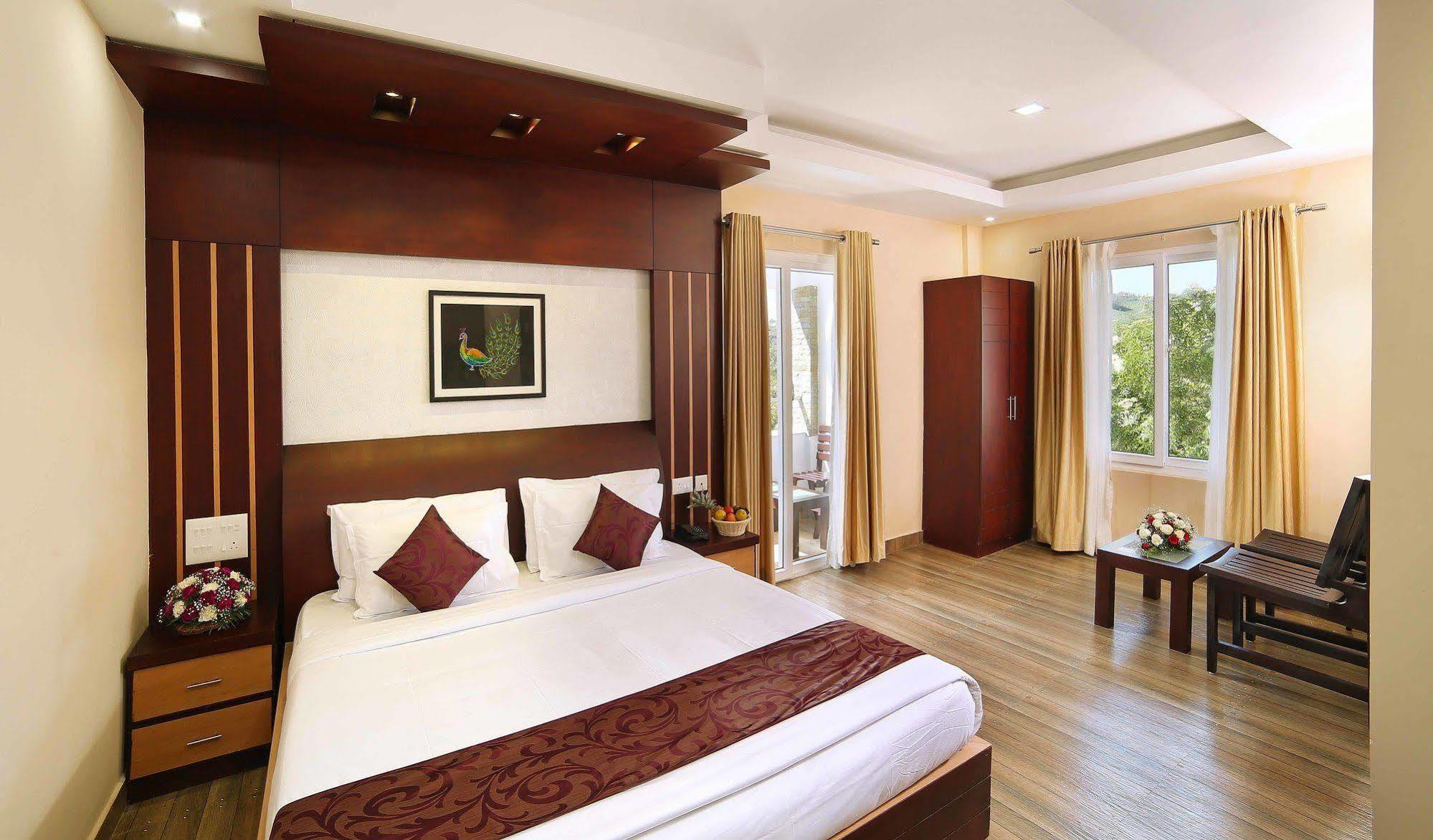 Elysium Garden Hotel Munnar Bagian luar foto