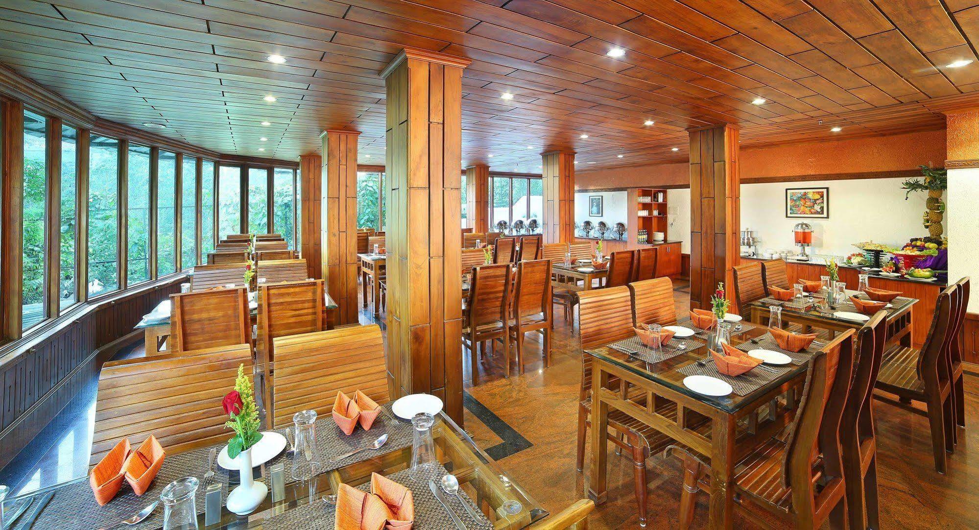Elysium Garden Hotel Munnar Bagian luar foto