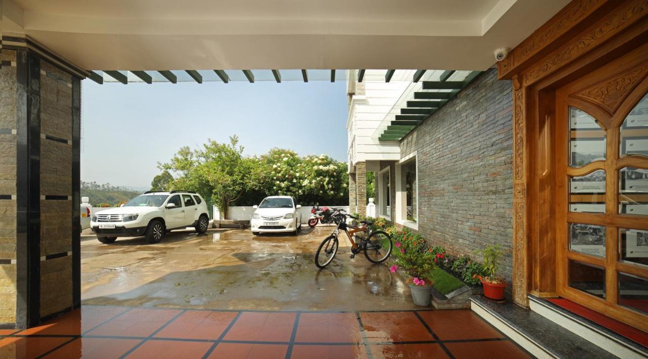 Elysium Garden Hotel Munnar Bagian luar foto